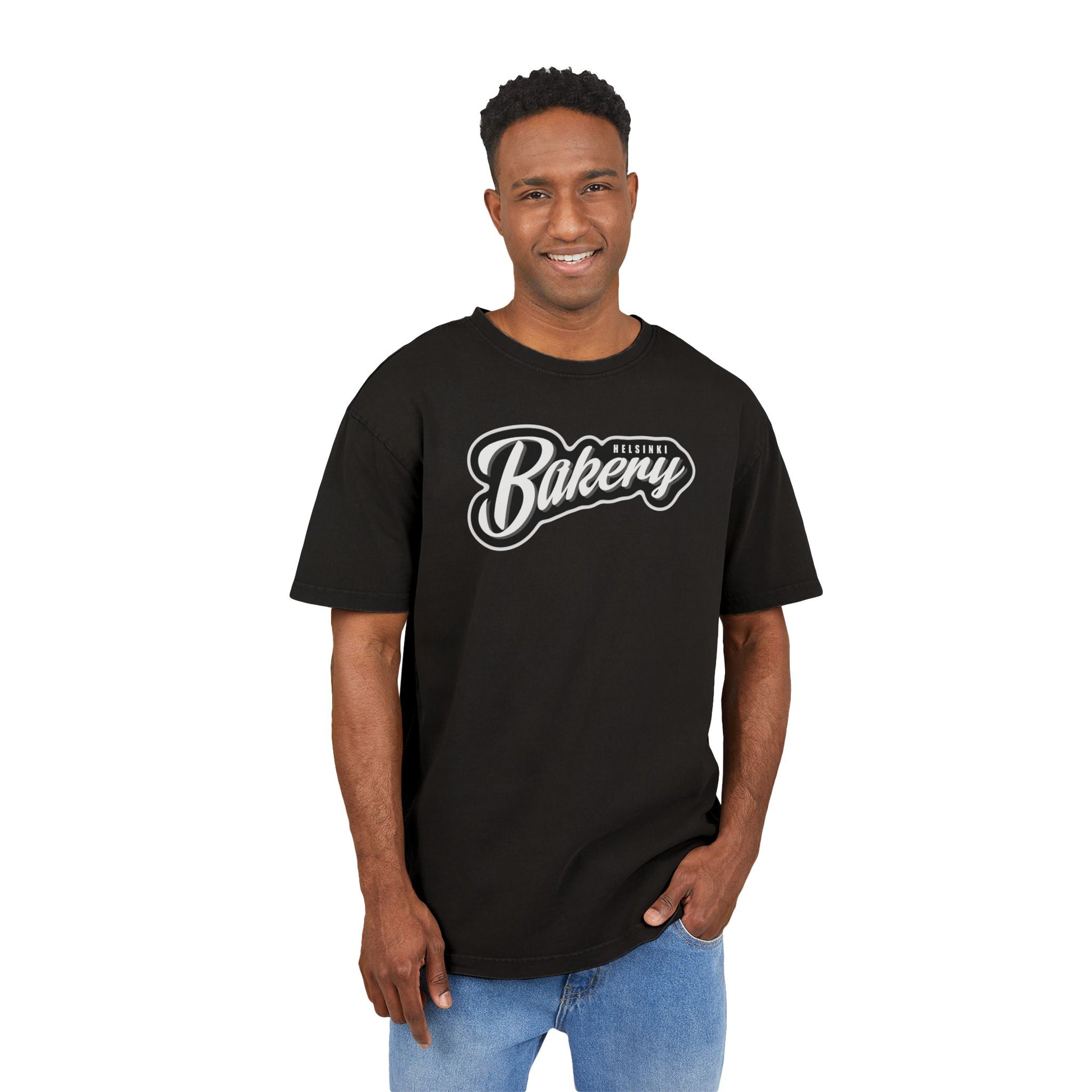 Man wearing a black t-shirt with 'Bakery' logo on a white background, front