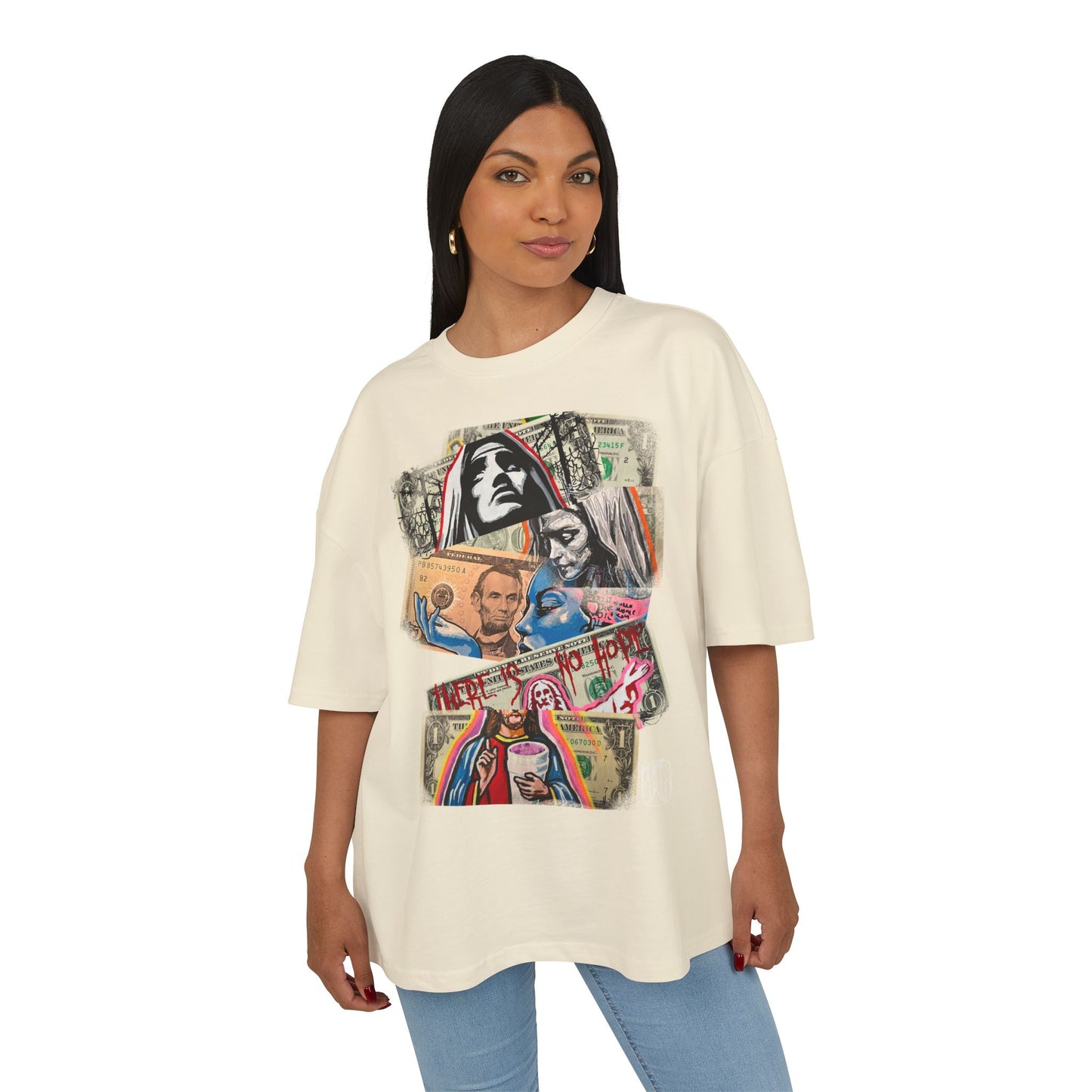 woman wearing sand boxt-shirt with stacked dollars and a bold artistic graphic print in the center, front
